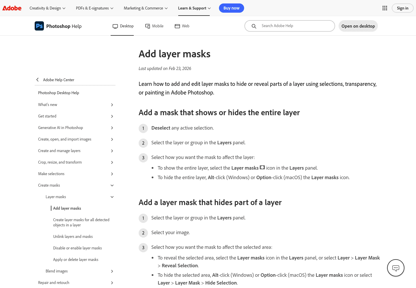 Adobe Photoshop Help page explaining how layer masks hide and reveal parts of a layer.